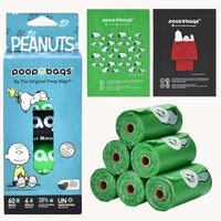 Rollos de bolsas para perro verdes y negros con ilustración de Charlie Brown