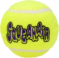 Empaque oficial de la pelota KONG SqueakAir con el lema Dogs Need to Play