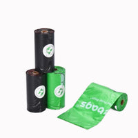 Rollos de bolsas para perro verdes y negros
